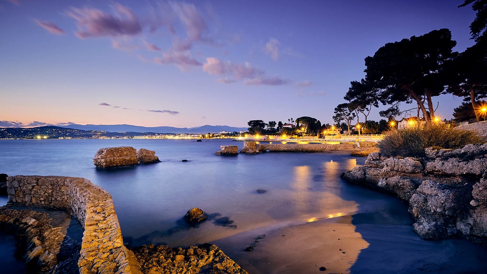 Golden-hour light on the sea at Antibes, at the end of a day inland