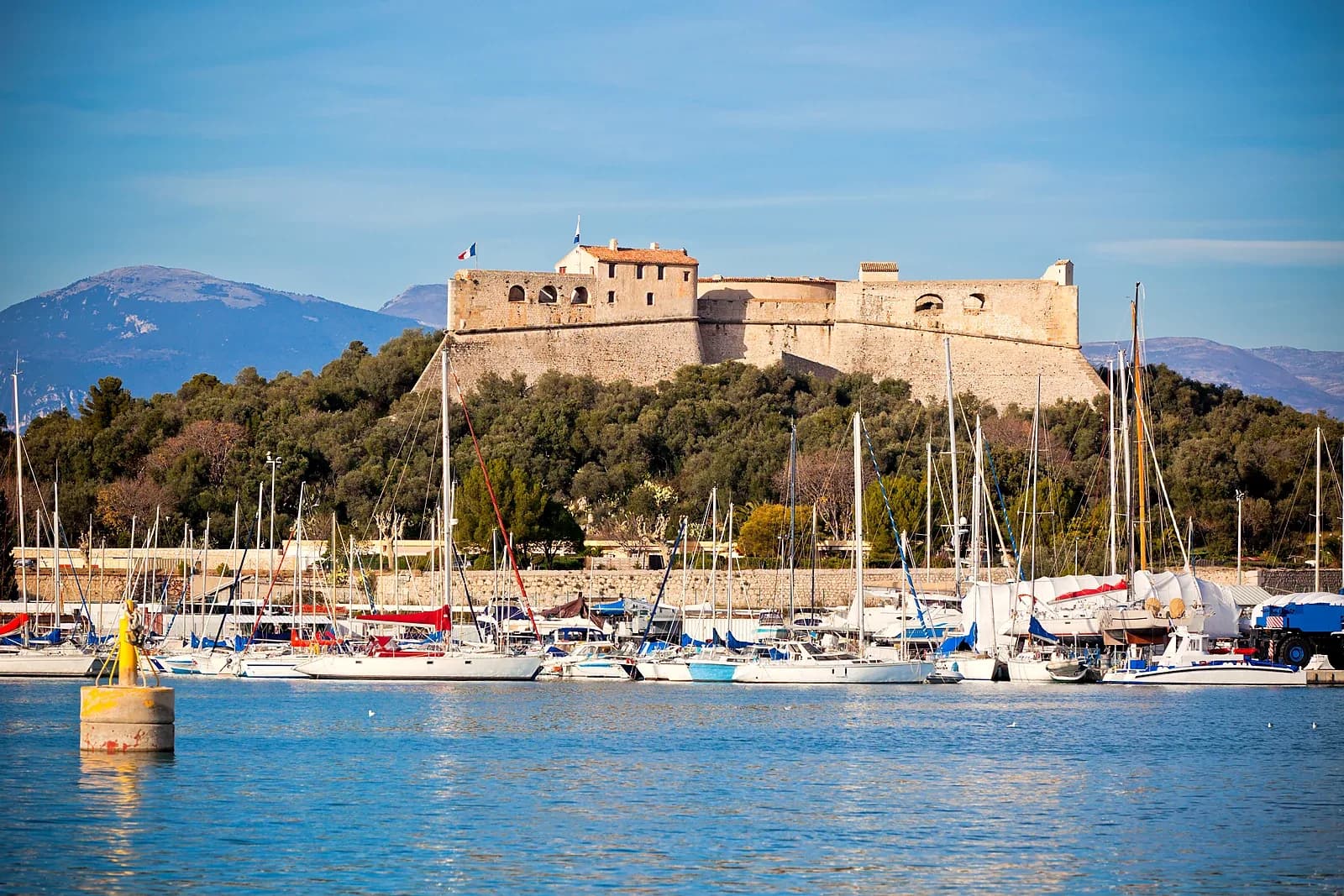 The star-shaped Fort Carré of Antibes seen across the water of Port Vauban