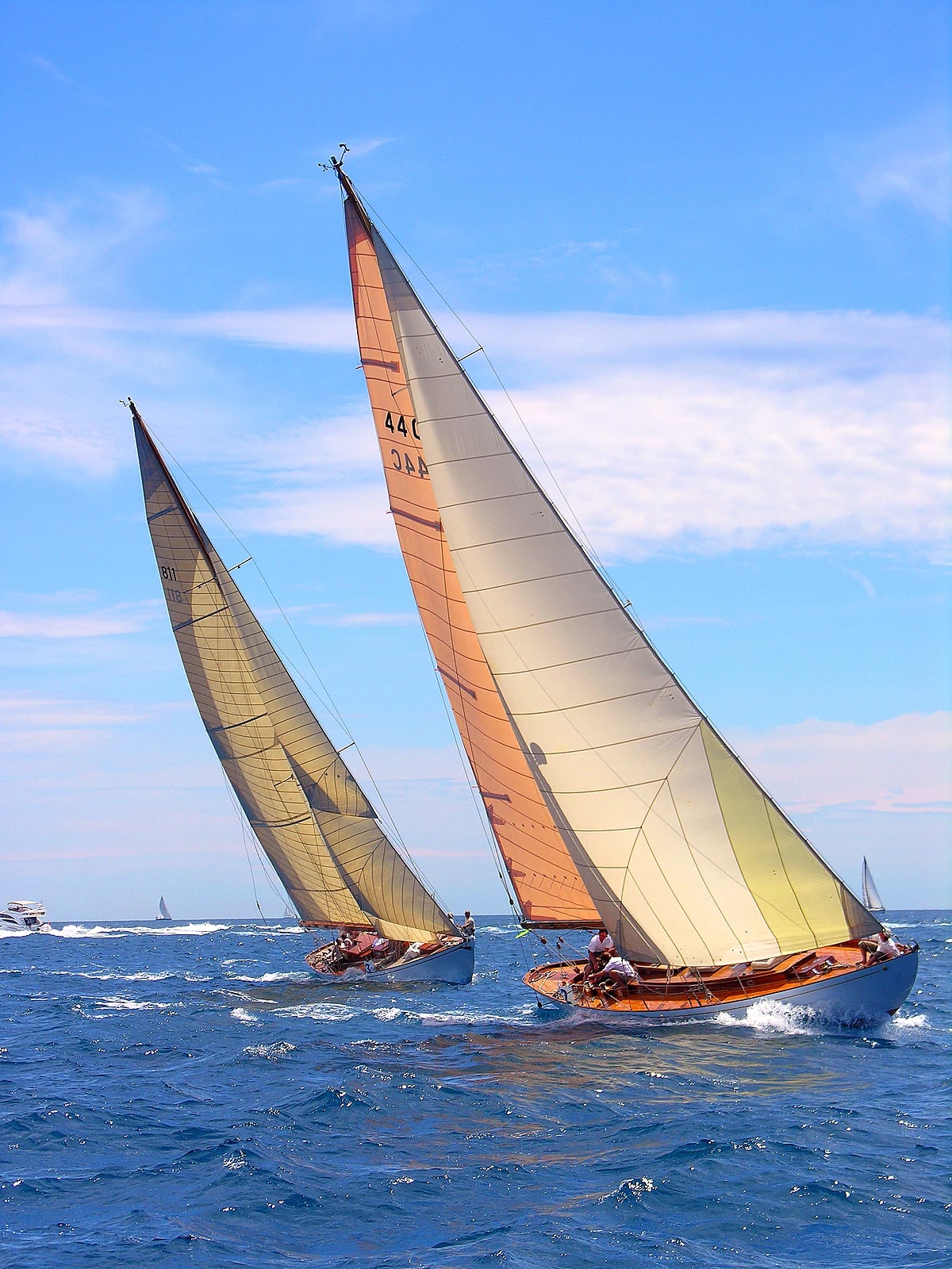 Classic wooden yachts under full sail racing in the bay of Antibes